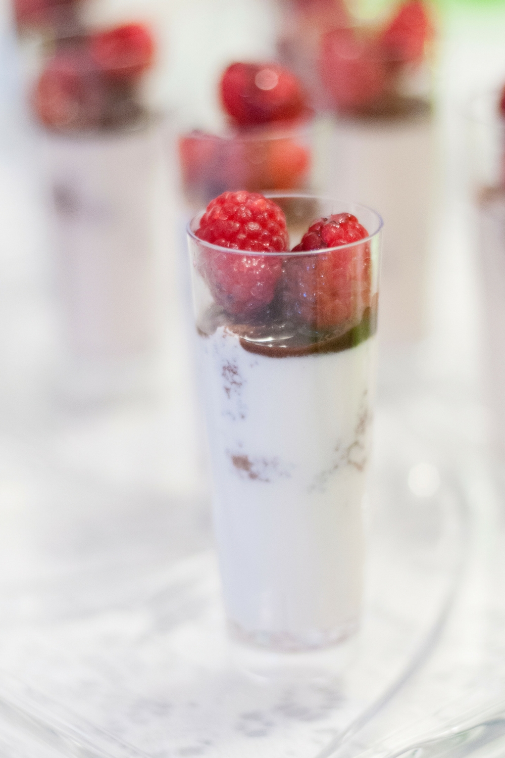 Easy Raspberry Dream Mini Parfaits begin with bites of chocolate cake ...