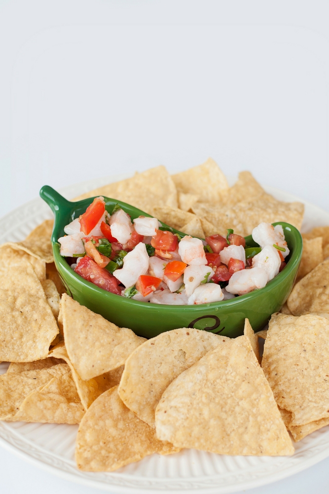 Easy Shrimp Dip is bursting with fresh flavors and textures. Whether it's served with tortilla chips, filling for tacos or on its own it's always a hit